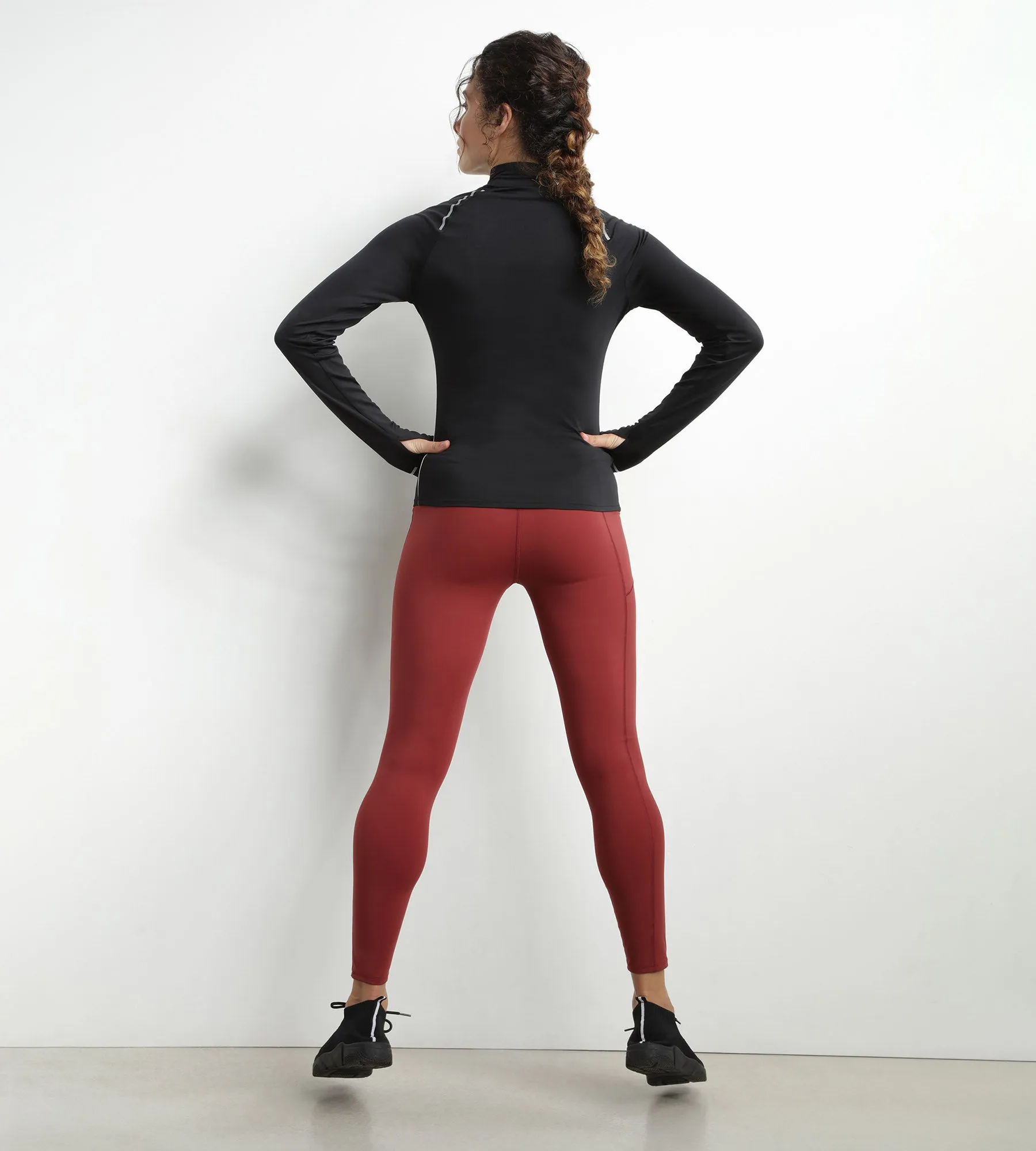 Women's sports top with high collar in black microfiber Dim Move